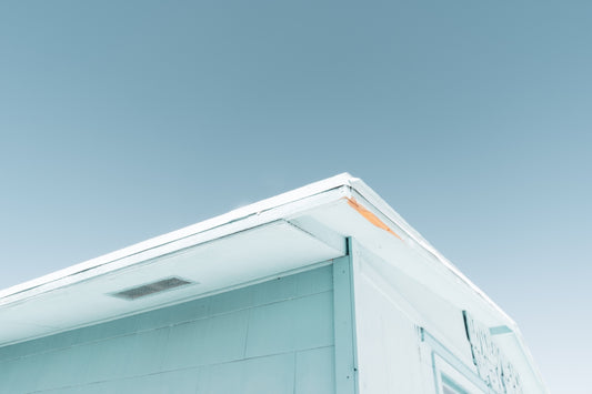 white concrete building under blue sky during daytime