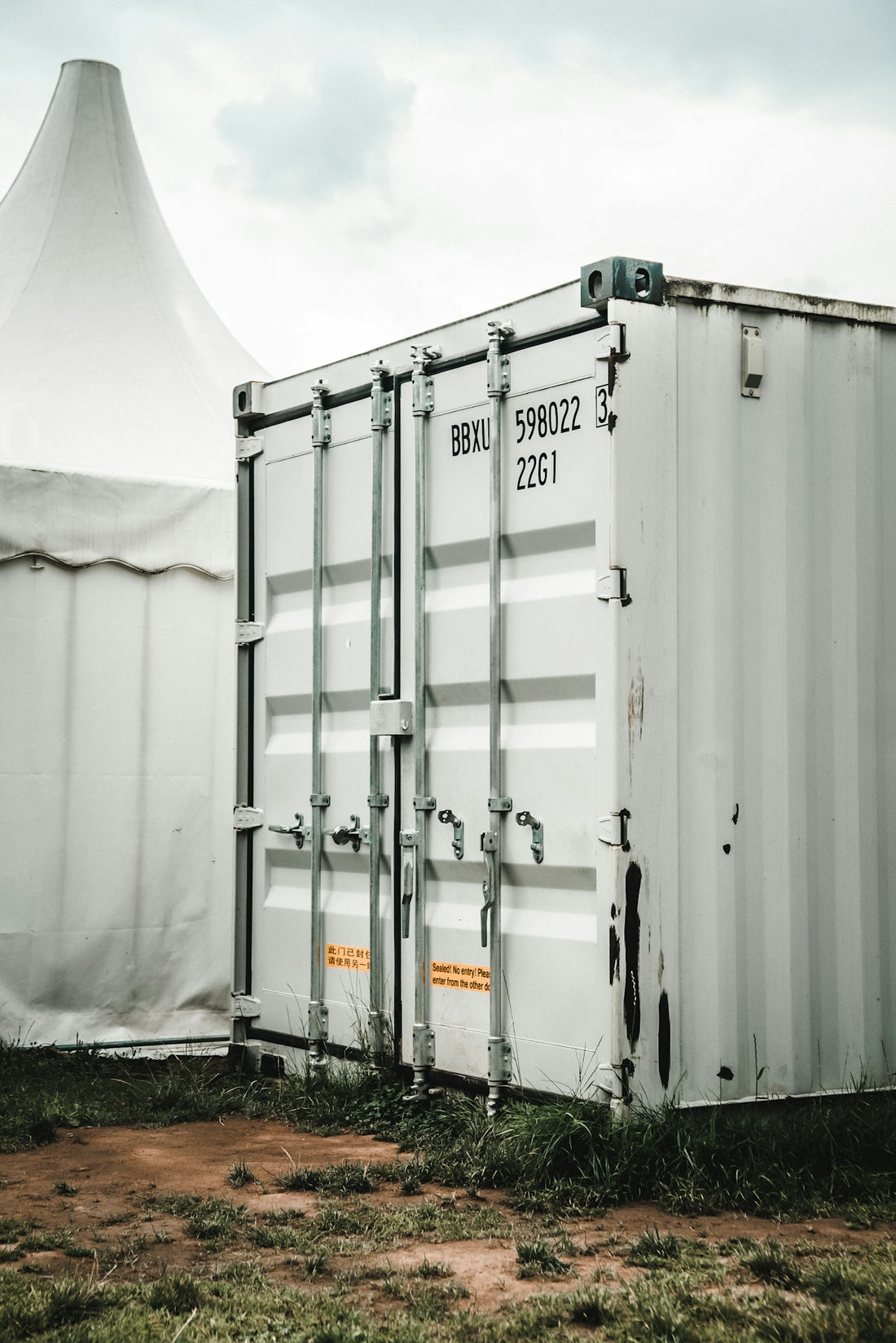 white and blue steel container van