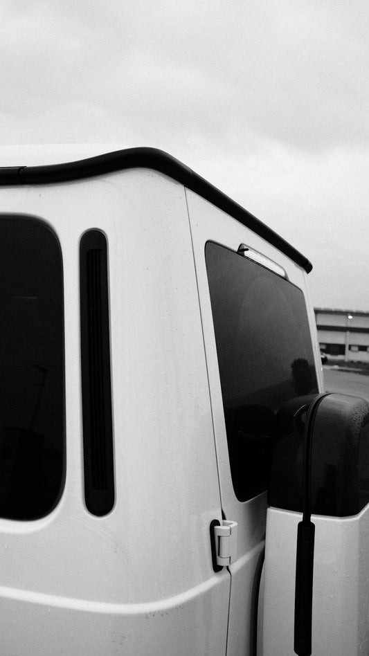 Side view of a white car.