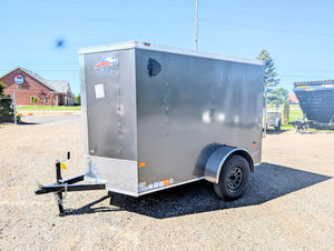 2026 American Hauler Arrow 5x8 Enclosed Cargo Trailer Pewter – front driver-side 3/4 view, charcoal exterior, black steel wheels, single axle