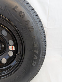 205/75R15 LoadStar ST Radial Trailer Tire w/ 15" Black Mod Wheel - 5 on 4-1/2 -LR C - close-up view | AAA Trailer