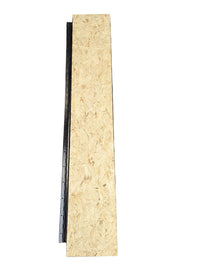 A beige ramp extension with piano hinge placed on a gray surface.