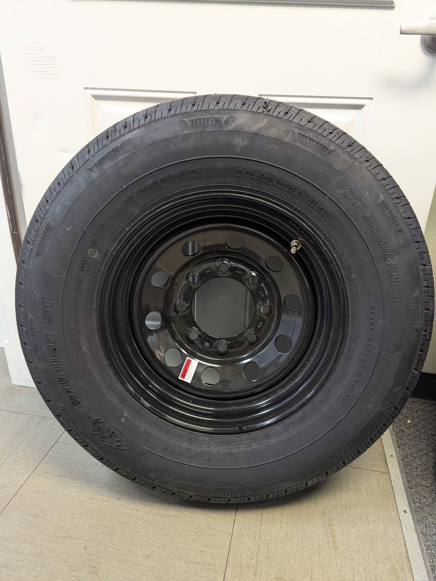 Rainier ST 235/80R16 10 Ply Tire with 16" Steel Wheel