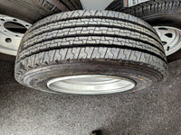8 Lug 17.5" Steel Wheel with 215/75R17.5 Load Range F Tire - alternate angle | AAA Trailer