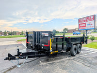 Black Griifin  dump trailer parked on a paved surface with a AAA trailer sales sign in the background.