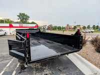 Dump trailer with open bed in a parking lot, featuring AMO Trailers branding.