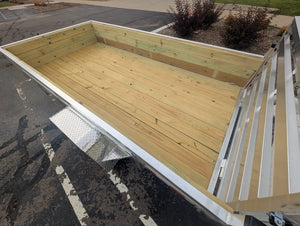 Wooden deck or platform on a Silver Ox  trailer in an outdoor setting