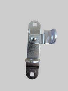 Metal latch on a textured beige background