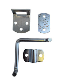 Set of metal brackets and fasteners on a gray background