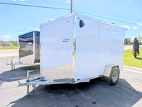 2026 AmeraLite Storm 6x10 White — driver side full profile showing poly composite exterior, diamond plate skirt, and aluminum extrusions | AAA Trailer Howell MI