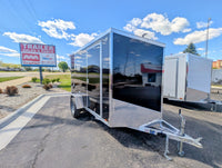 2026 AmeraLite Storm 6x10 Black — driver side full profile at AAA Trailer Howell MI | Poly composite exterior, diamond plate skirt, aluminum extrusions