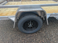 Silver Ox 7x10 Trailer — 205/75R15 radial tire on black mod wheel with diamond plate aluminum fender and EZ-Lube hub cap