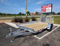 Silver Ox flat deck aluminum trailer rear three-quarter view with folding ramp stowed