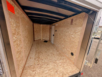 Cargo Mate 5x10 E Series Enclosed Cargo Trailer w Ramp Door & Side Door Stock 124133 - 2400 lbs, 5x10 - close-up view | AAA T