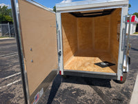 Cargo Mate E Series 4x6 Enclosed Cargo Trailer - Silver - Stock# 123132 - 2,000 lbs, 4x6 - close-up view | AAA Trailer