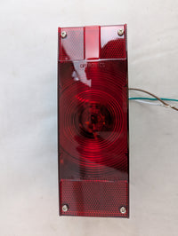 Optronics ST17RB Waterproof Trailer Tail Light – Driver Side Stop/Turn/Tail with License Plate Light (8-Function) - close-up 