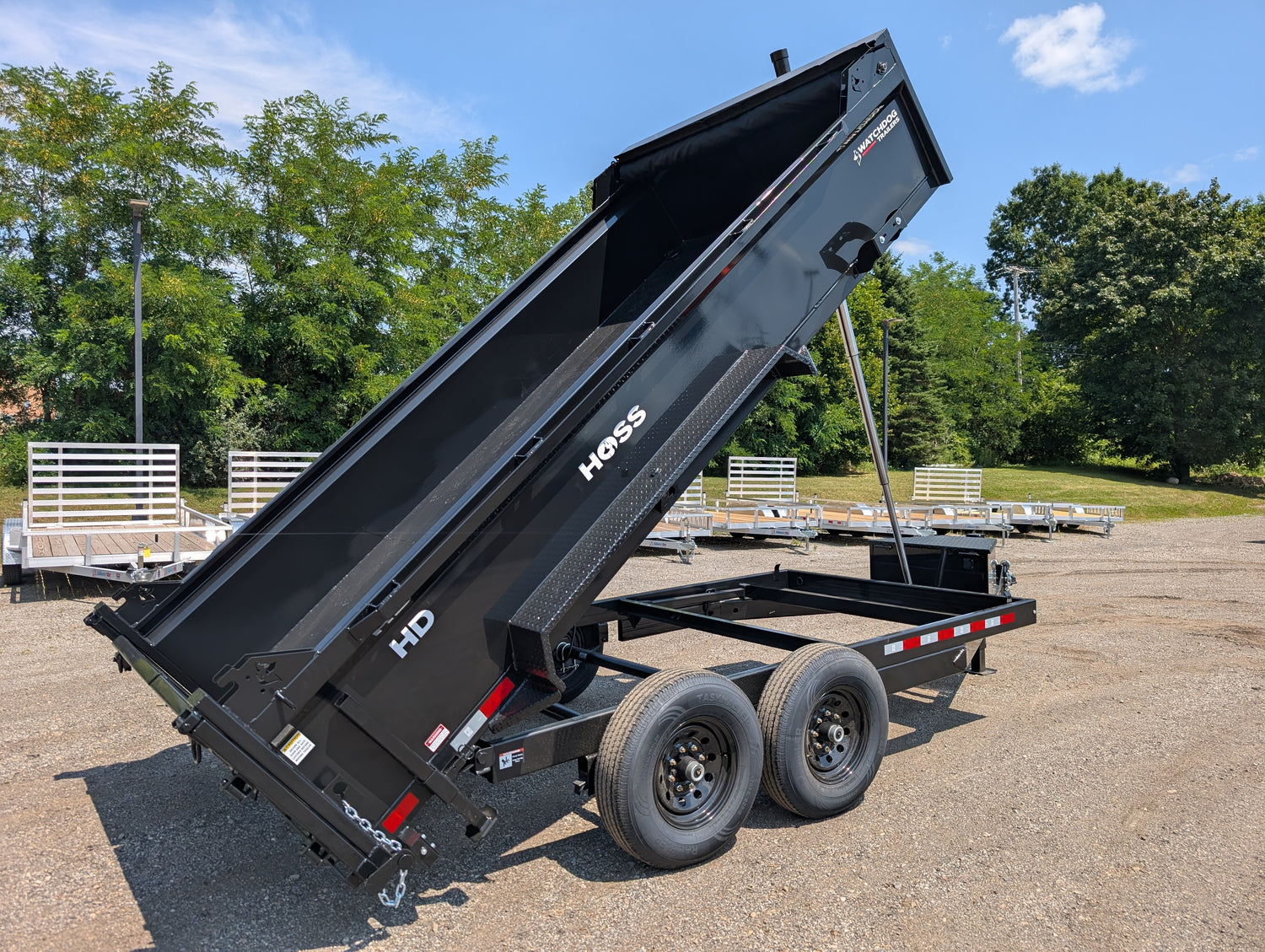 Watchdog HOSS 7x14 dump trailer, 14K GVWR telescopic with Speed Driver standard tongue jack — driver-side profile (1 of 23)