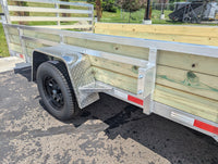 Silver Ox 7x14 aluminum ATV trailer - full exterior view showing aluminum frame and 18 inch wood sides