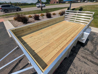 Silver Ox 7x14 aluminum ATV trailer - rear three quarter view with folding ramp gate raised