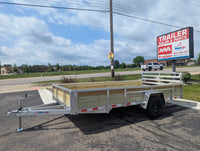 Silver Ox 7x14 aluminum ATV trailer - exterior side view showing 18 inch wood side rails and 3500 lb axle