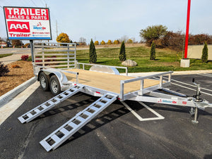 Silver Ox 7x16 aluminum tandem axle utility trailer with heavy duty package and side ramps