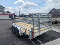 Silver Ox 7x16 tandem aluminum utility trailer HD - front three quarter view with coupler in foreground