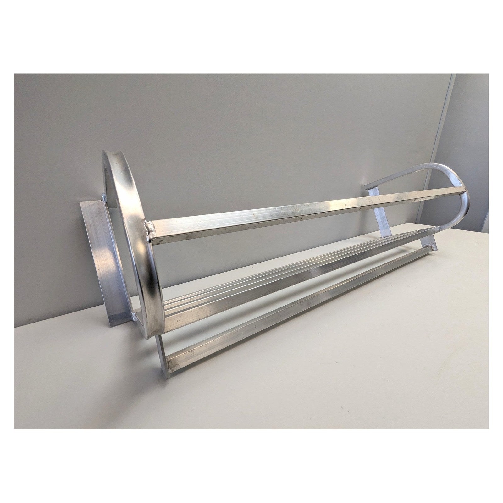 Wall mounted Snowmobile & ATV Helmet Trailer Rack