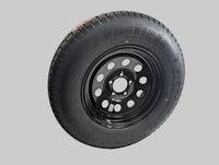 ST205/75R15 black steel modular trailer wheel - face and 5-lug bolt pattern detail | AAA Trailer
