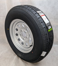 Taskmaster Contender 205/75R15 Tire on Vesper 5-Lug Gray Steel Wheel - 1820 lbs, 50 PSI, 5x4.5 - detail view | AAA Trailer