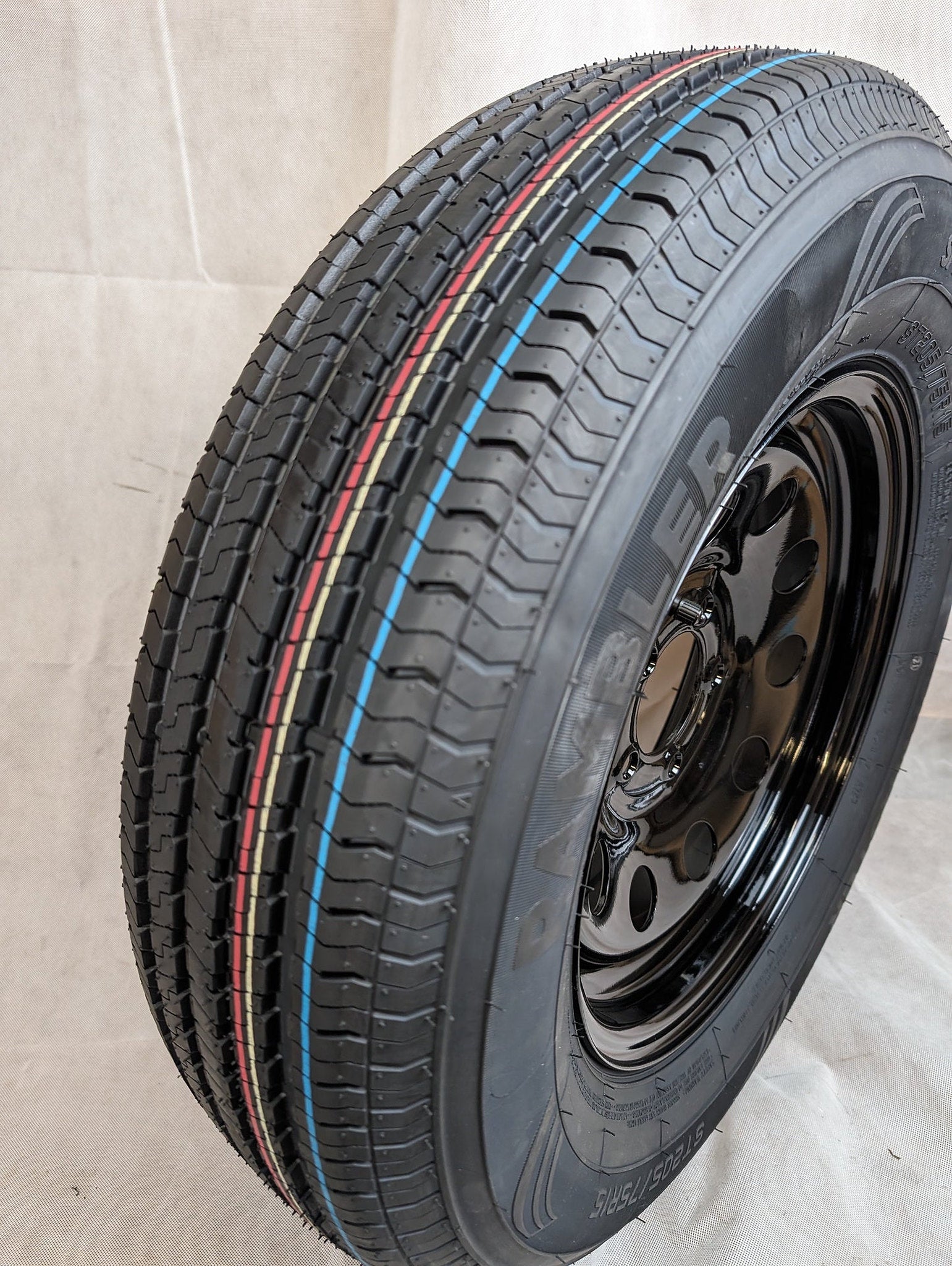 Taskmaster Rambler 205/75R15 Tire on Vesper 5-Lug 15