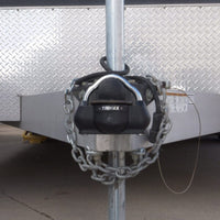 Trimax UMAX100 installed on a trailer coupler — 360 degree hardened steel protection