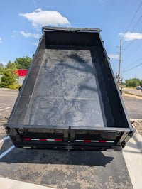 Watchdog Wrangler dump trailer — tandem 7,000 lb axles with electric brakes