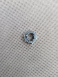Zinc-Plated 7/16" Mounting Nut for 7" & 10" Trailer Brakes - detail view | AAA Trailer