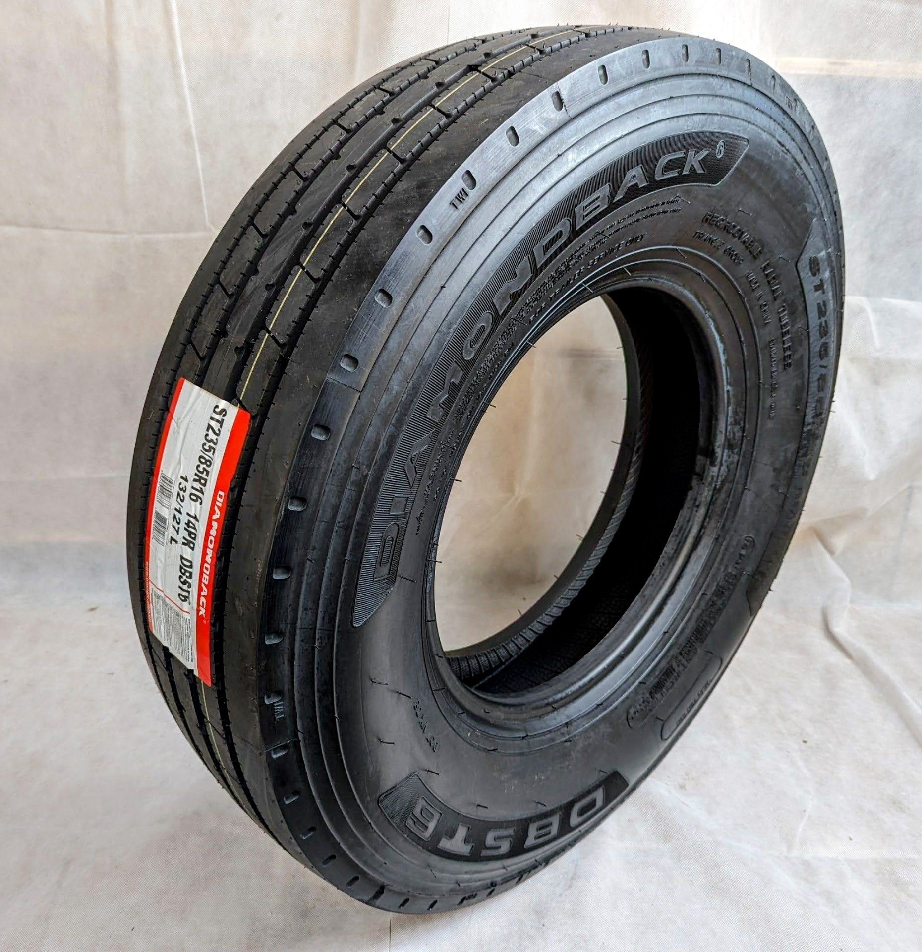 235/85/16 Diamondback 14 ply, Load G, Tire only - full product view | AAA Trailer