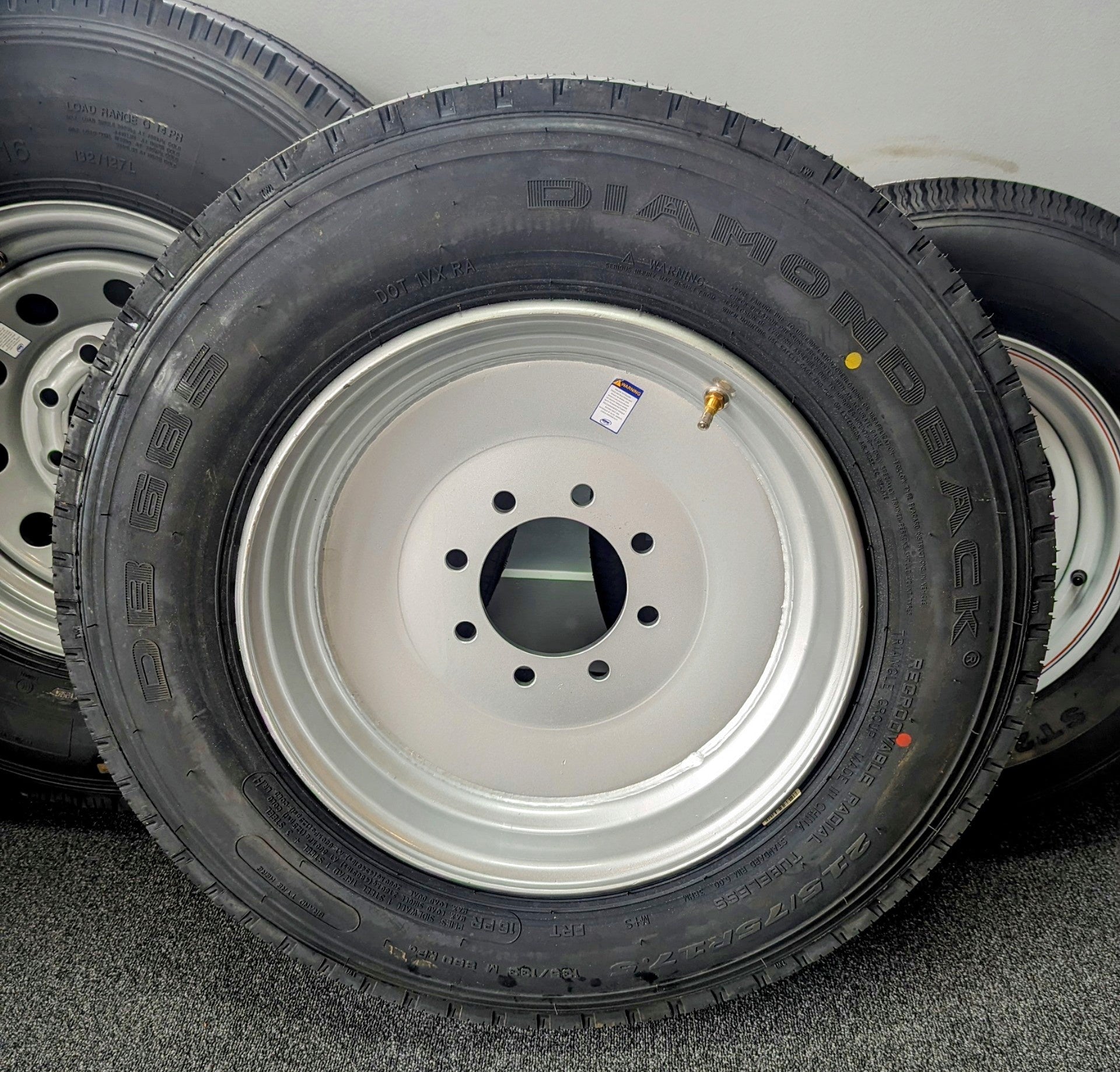 8 Lug 17.5" Steel Wheel with 215/75R17.5 Load Range F Tire - full product view | AAA Trailer