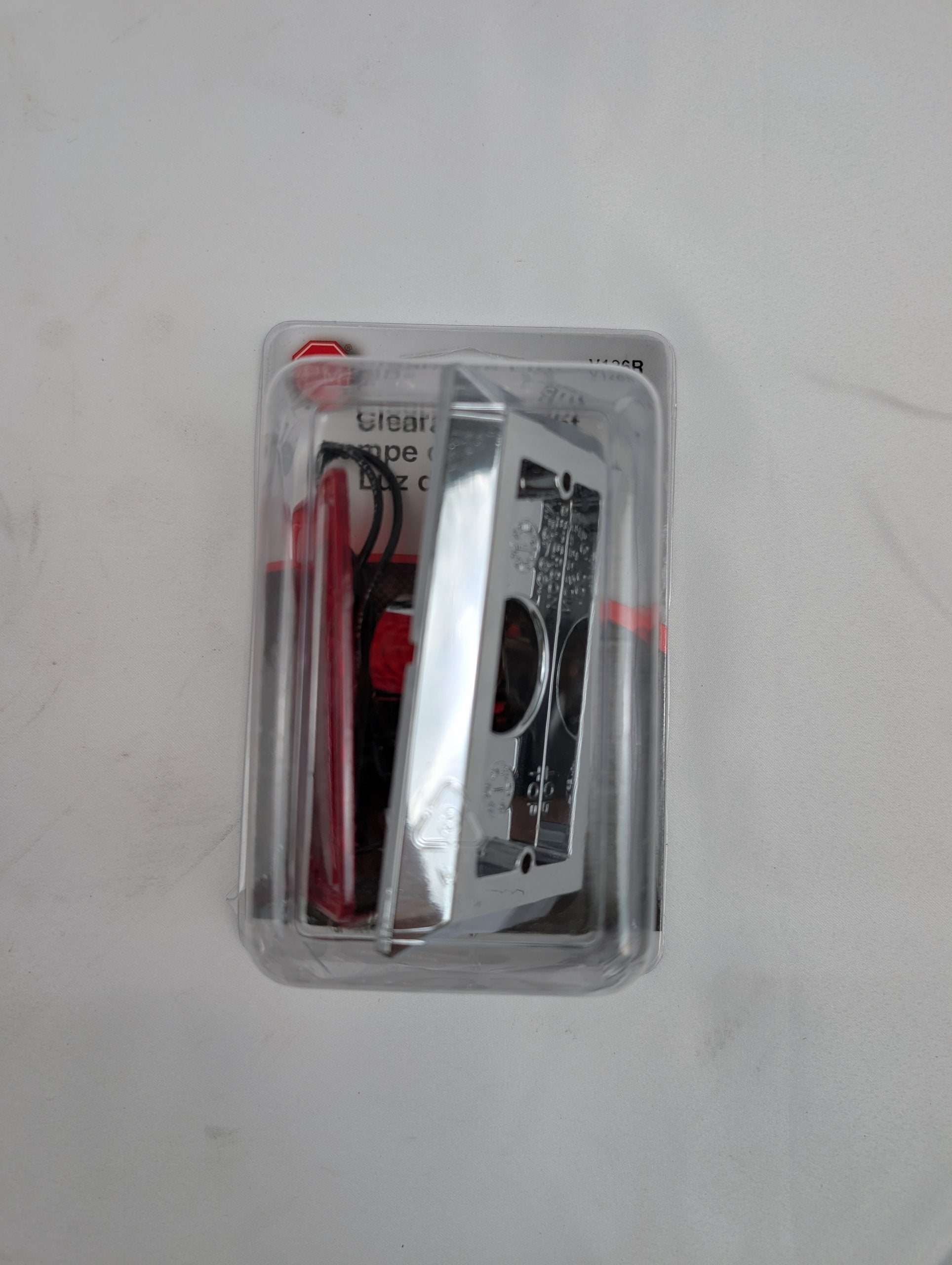 Peterson V126R red rectangular clearance and side marker light, incandescent, chrome ABS – sealed retail Viz Pack, front | AAA Trailer